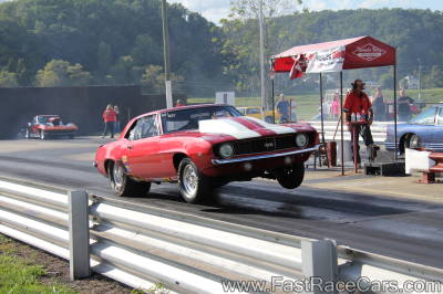 Red Camaro Popping A Wheelie Red Camaro Popping A Wheelie